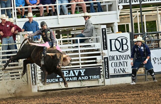 A bull rider competes at the 2025 Wild Bill Hickok Rodeo in Abilene. Tickets go on sale June 1 for this year’s rodeo, which is July 28-31. Photo by Fly Thomas.