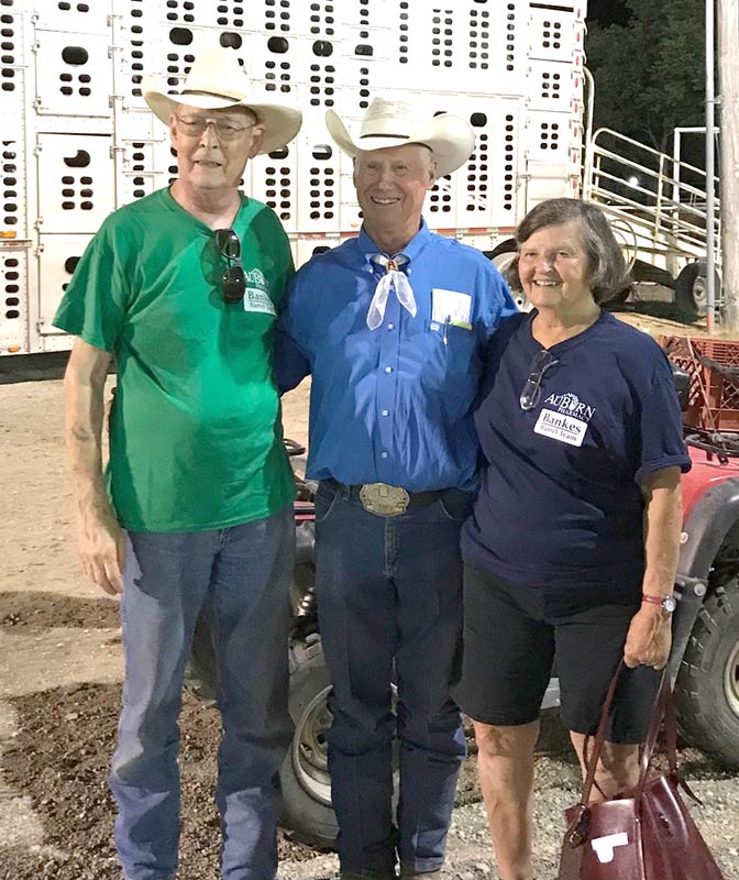 Bud and Linda Bankes with stock contractor Sammy Andrews in 2018.  The Bankes made friends with rodeo personnel throughout the years. 