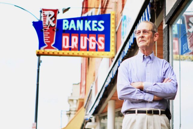 Bud Bankes stands in front of the drugstore he owned and his dad purchased in the early 1940s. Bud sold the drugstore in 2015.